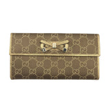 GUCCI CANVAS/LEATHER FLAP BOW LUXE WALLET GOLD