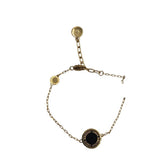 MARC JACOBS LOGO STAMP BRACELET GOLDTONE BLACK