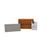 LOUIS VUITTON TAIGARAMA BRAZZA LUXE WALLET WHITE